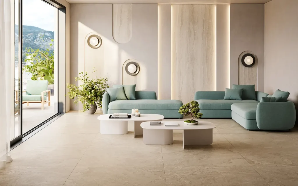 Gigacer Genesis kalksteenlook vloer in een woonkamer met groene bank